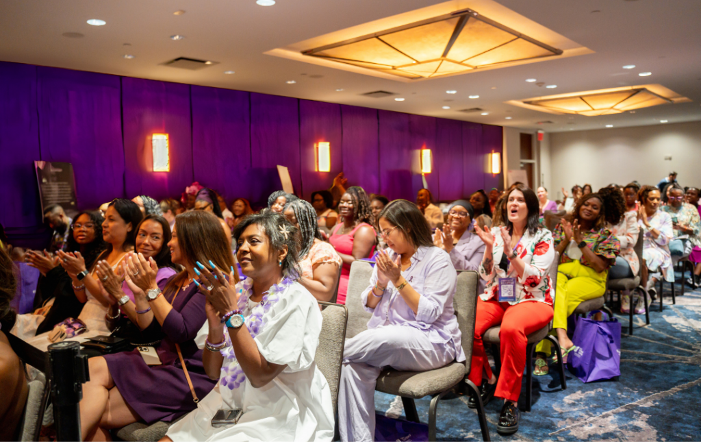 Crowd cheering for medical panel at Fibroid Fighters A Night in Full Bloom in New York City 2024