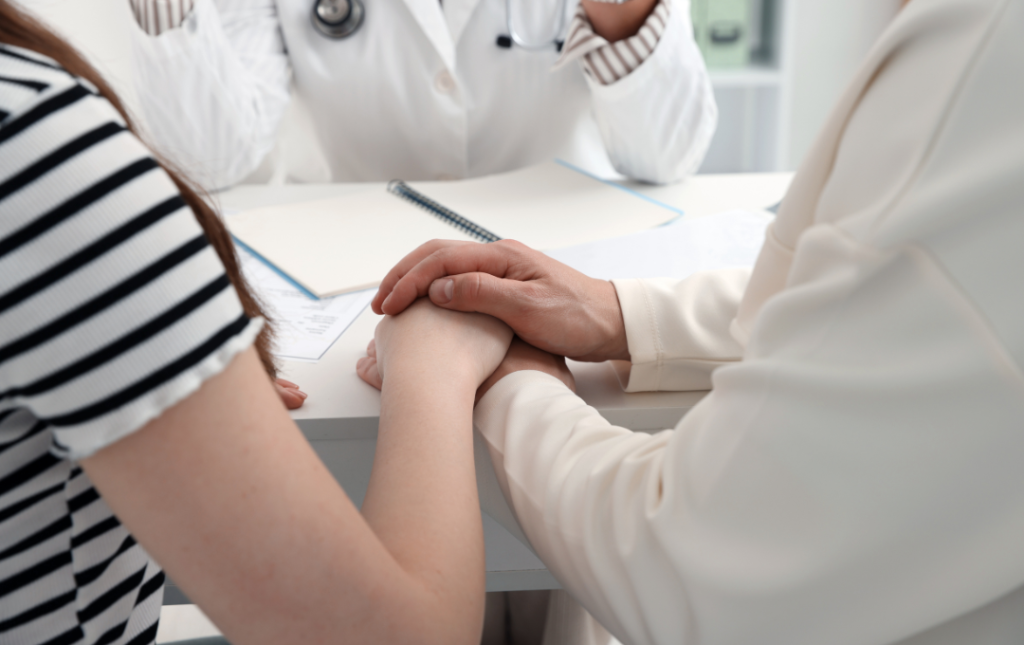 A couple consulting a fibroid and fertility specialist.